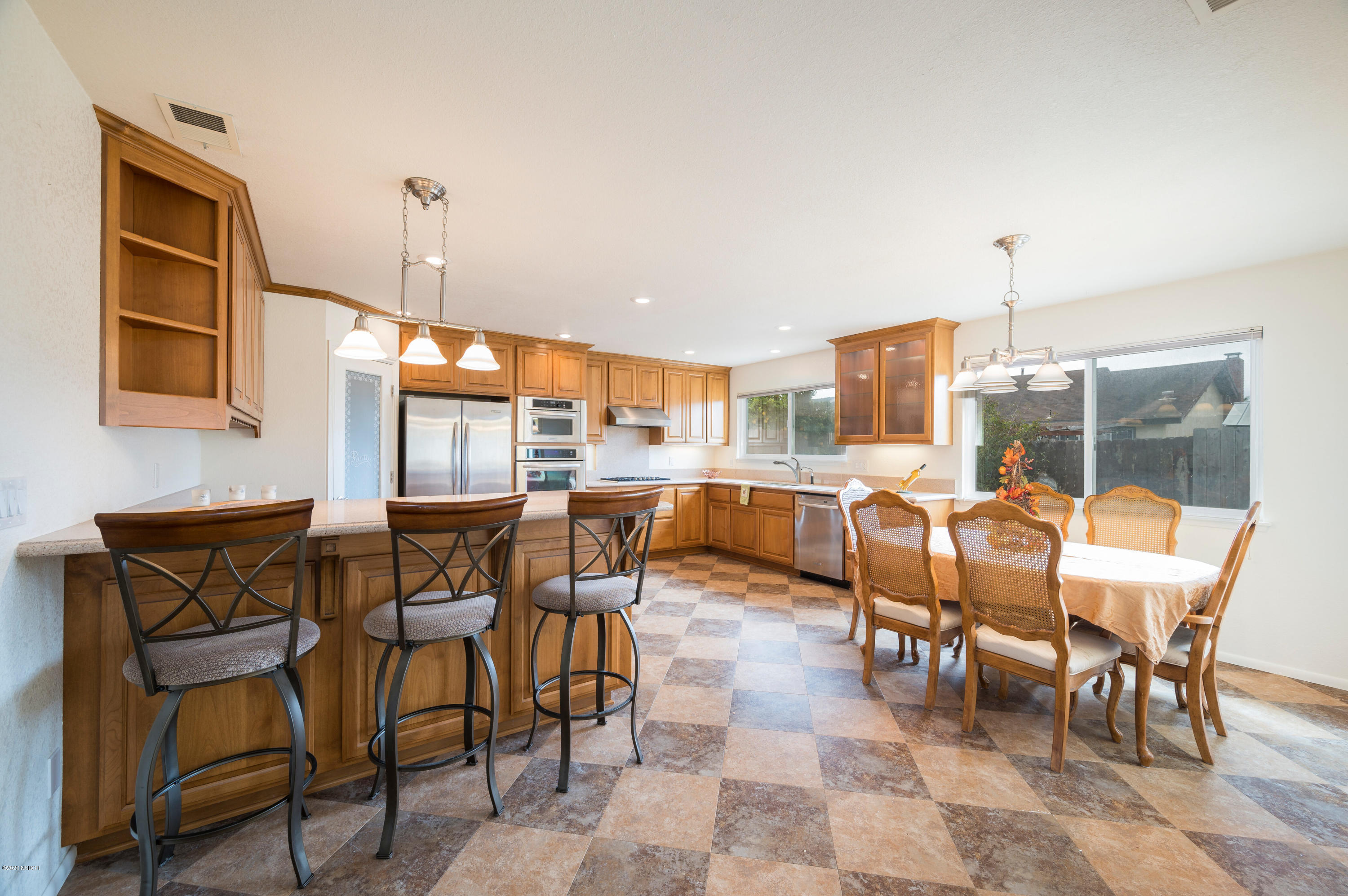 1008 West Anthony Way Lompoc, CA 93436 - Photo 7 of 26 a view of a dining room with furniture window and chairs