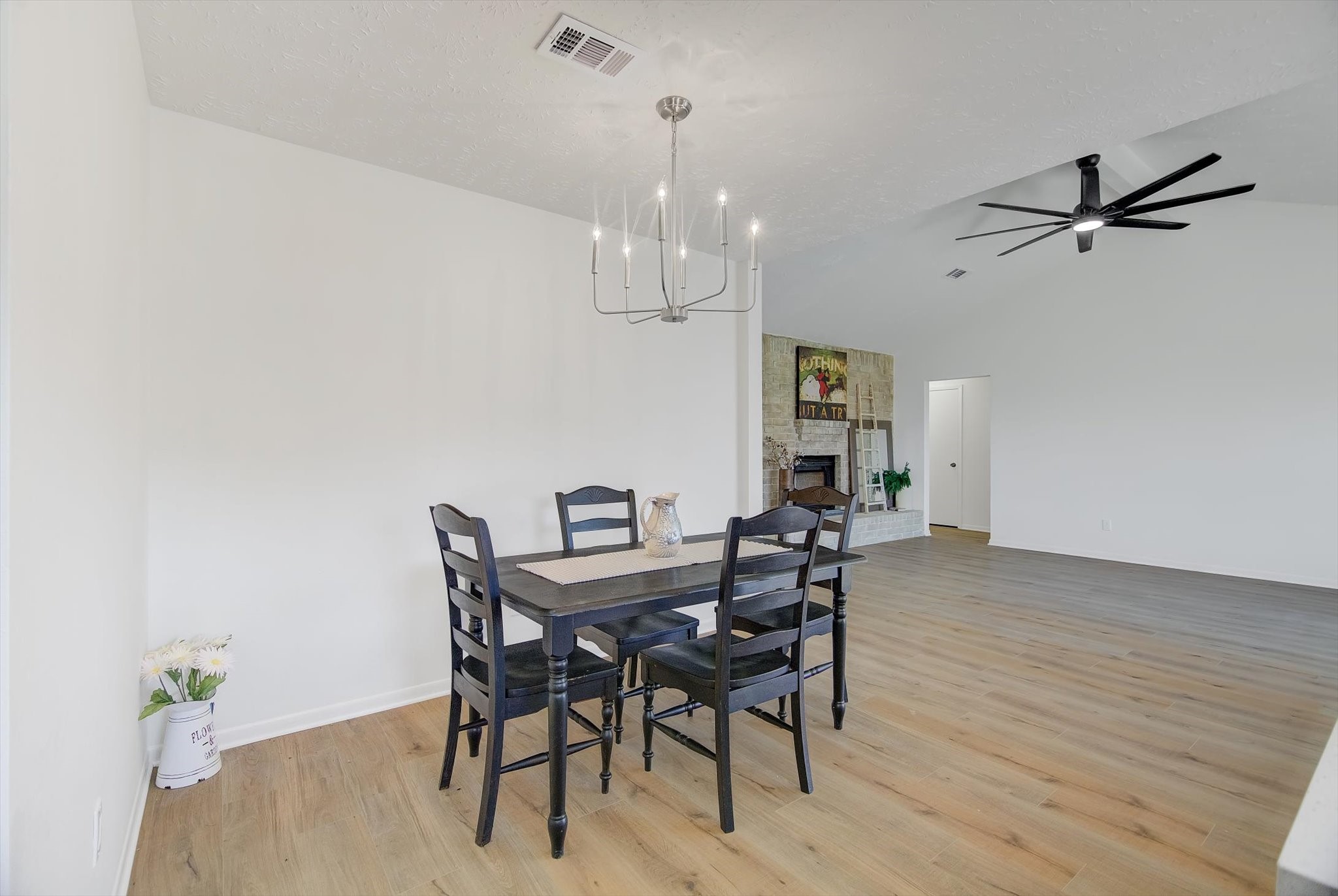 15110 Peachmeadow Lane Channelview, TX 77530 - Photo 12 of 34 a view of a dining room with furniture and wooden floor