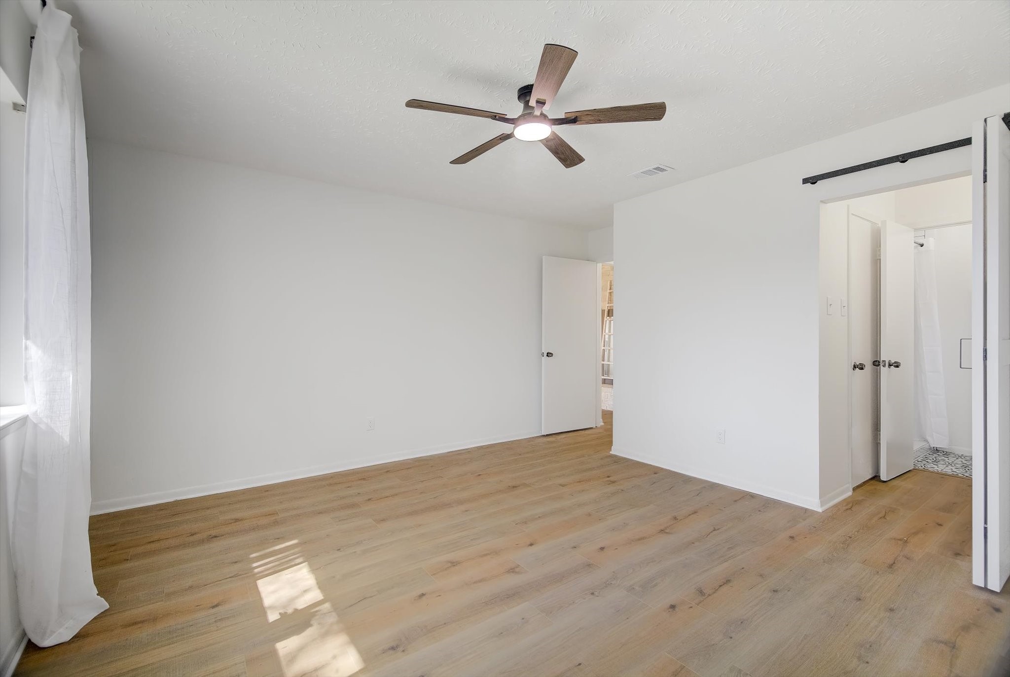 15110 Peachmeadow Lane Channelview, TX 77530 - Photo 20 of 34 a view of an empty room