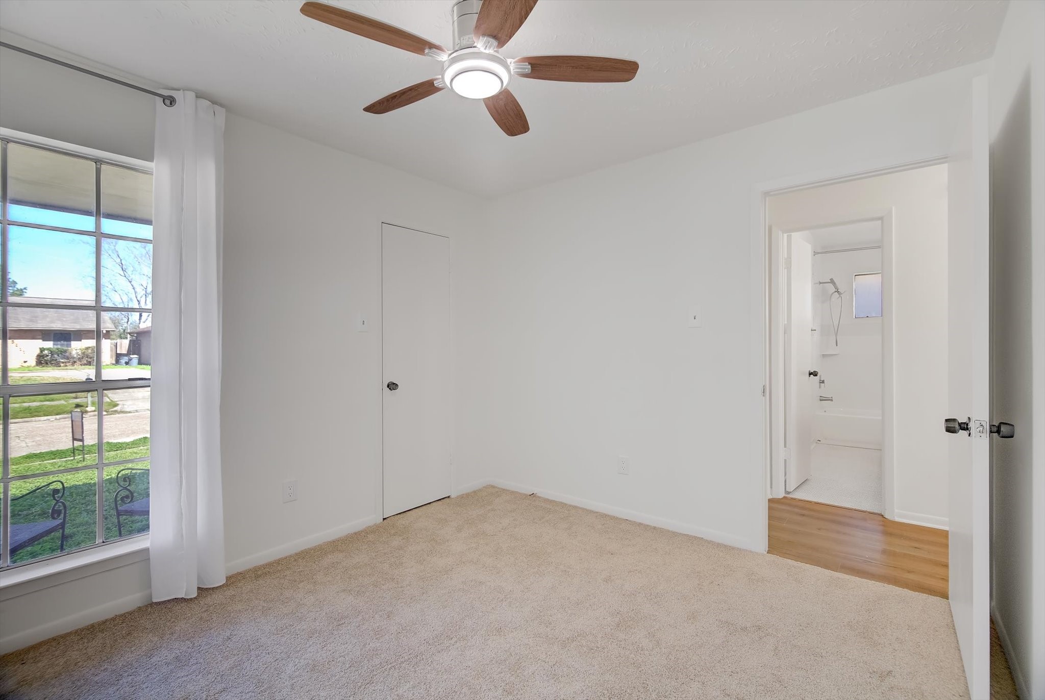 15110 Peachmeadow Lane Channelview, TX 77530 - Photo 25 of 34 a view of an empty room and window
