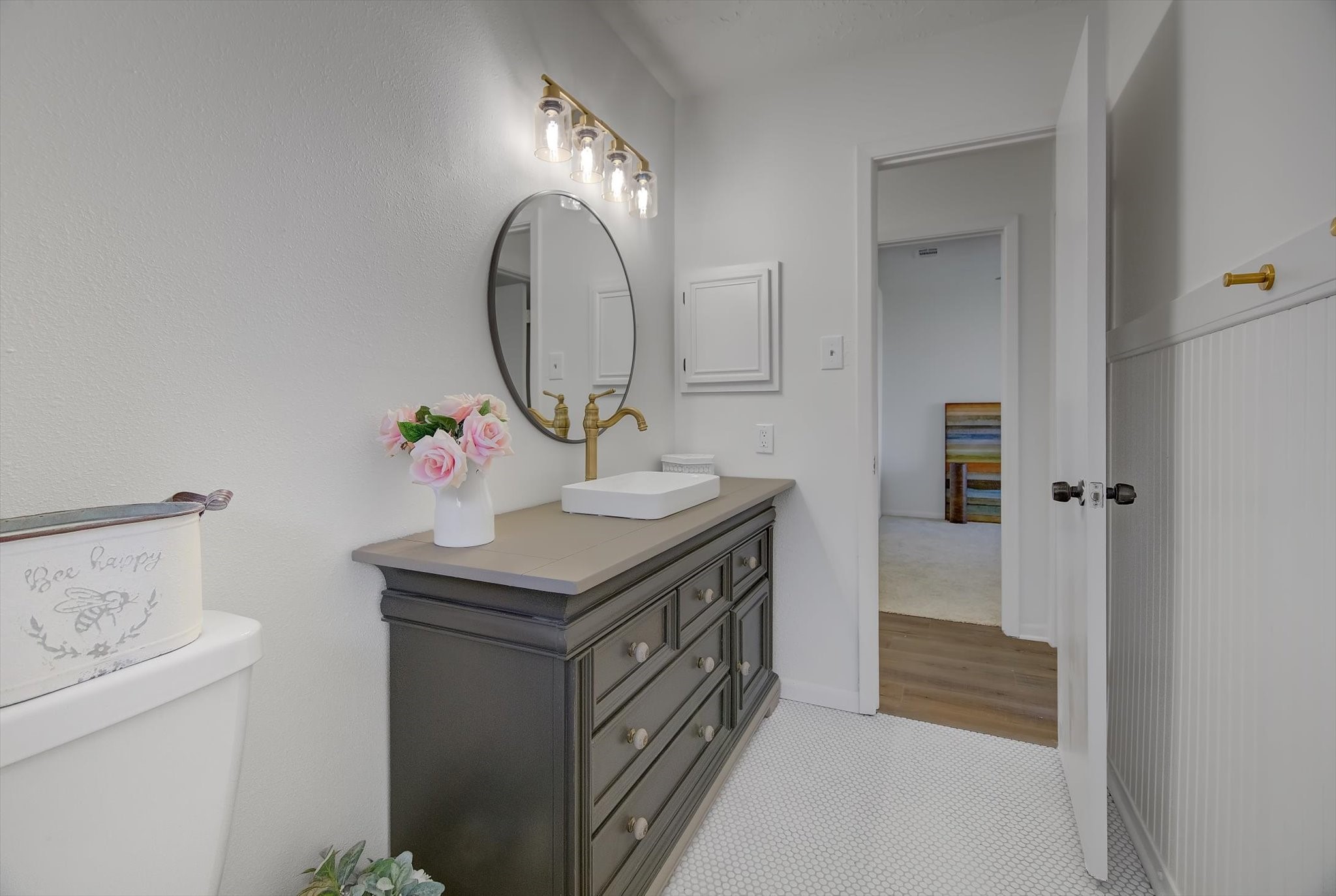 15110 Peachmeadow Lane Channelview, TX 77530 - Photo 29 of 34 a bathroom with a sink and a mirror