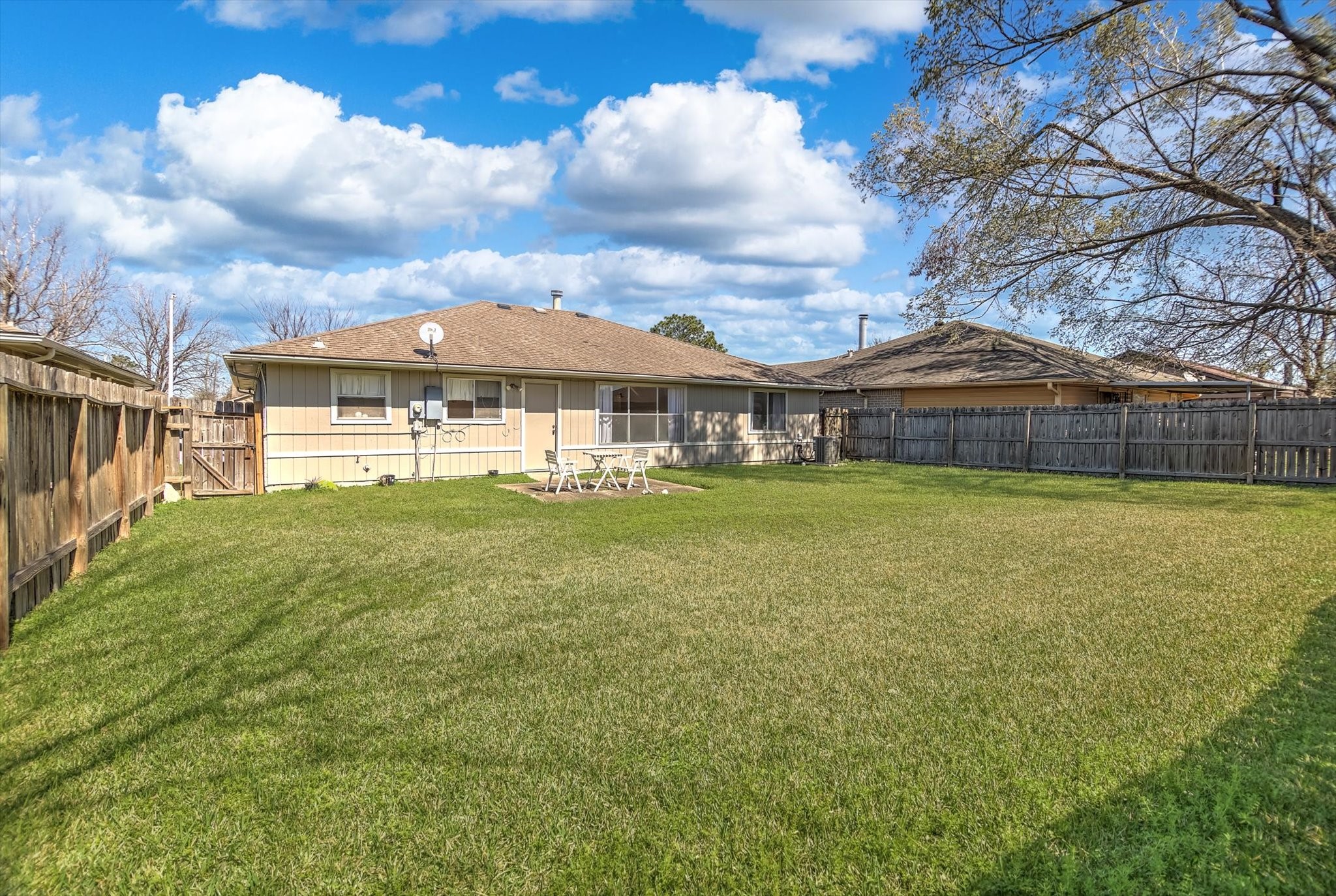 15110 Peachmeadow Lane Channelview, TX 77530 - Photo 32 of 34 a view of a house with a yard and sitting area