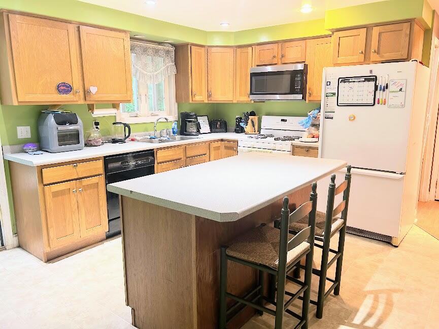 300 Webber Hill Road Kennebunk, ME 04043 - Photo 3 of 18 Sunny Kitchen With Center Island