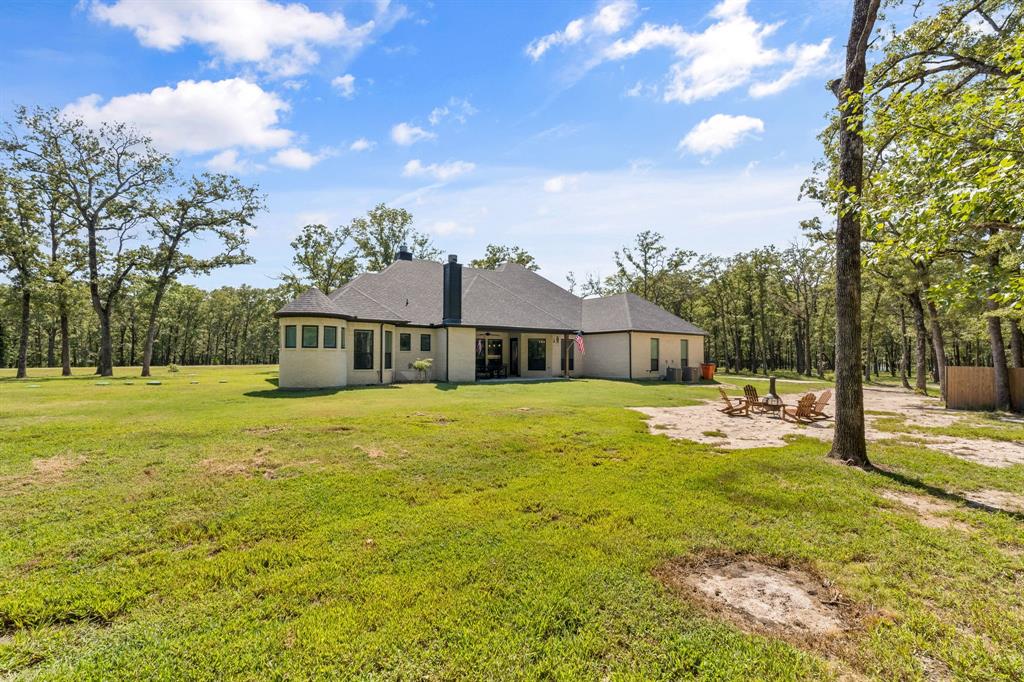 6707 Anchor Quinlan, TX 75474 - Photo 27 of 40 Expansive backyard flatted for the sparkling pool of your dreams