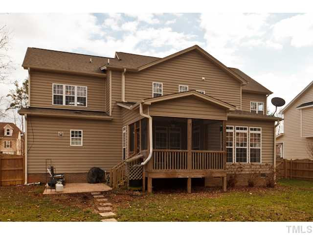 4216 Oakthorne Way Raleigh, NC 27613 - Photo 22 of 24 Fiber Cement Siding, Patio, and spacious Screend Porch. Exterior Back