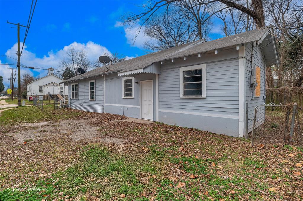 329 Edwards Street Bossier City, LA 71111 - Photo 12 of 12 a view of a house with a yard