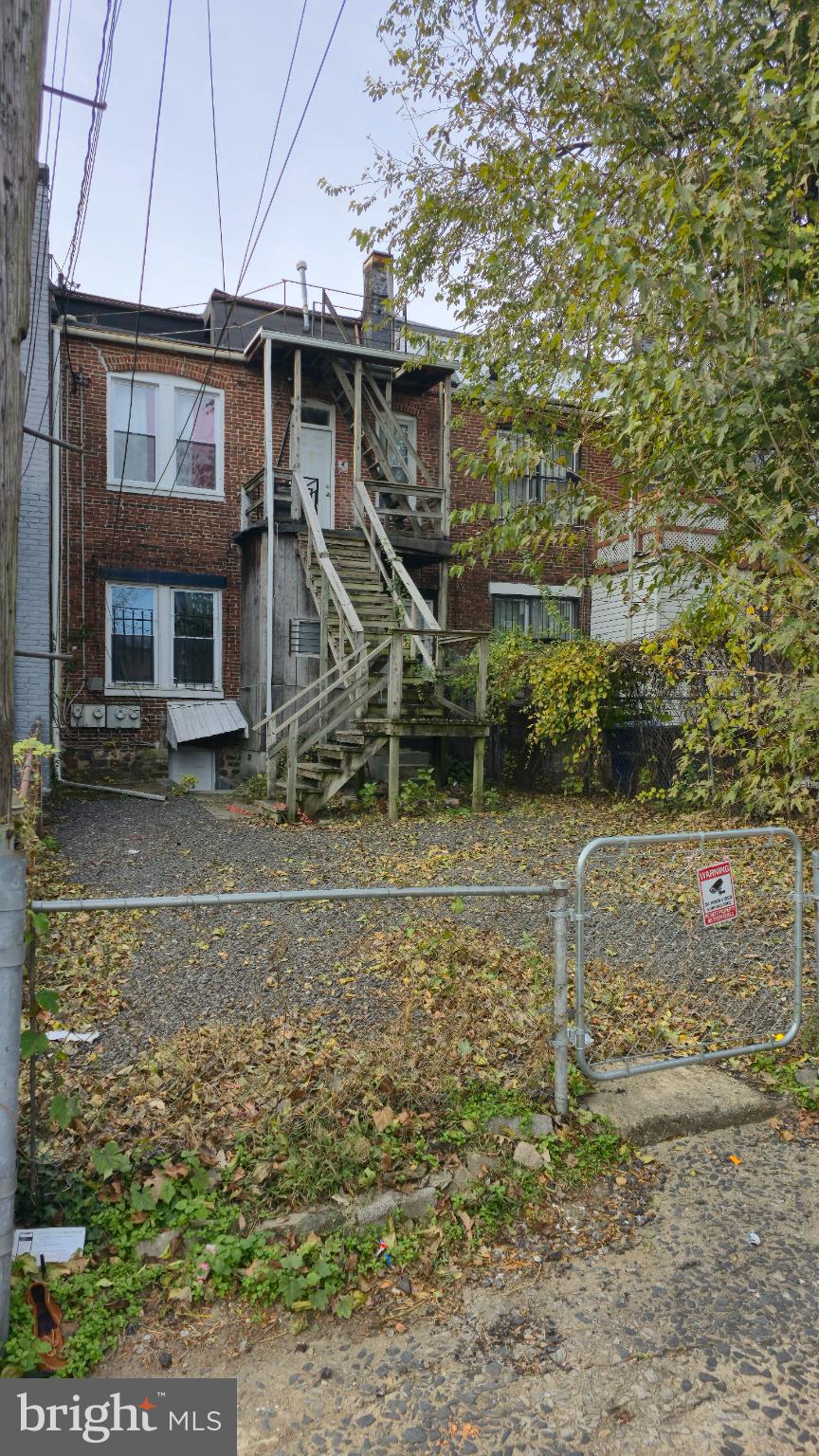 2413 Reisterstown Road Baltimore, MD 21217 - Photo 22 of 22 a view of a house with a yard