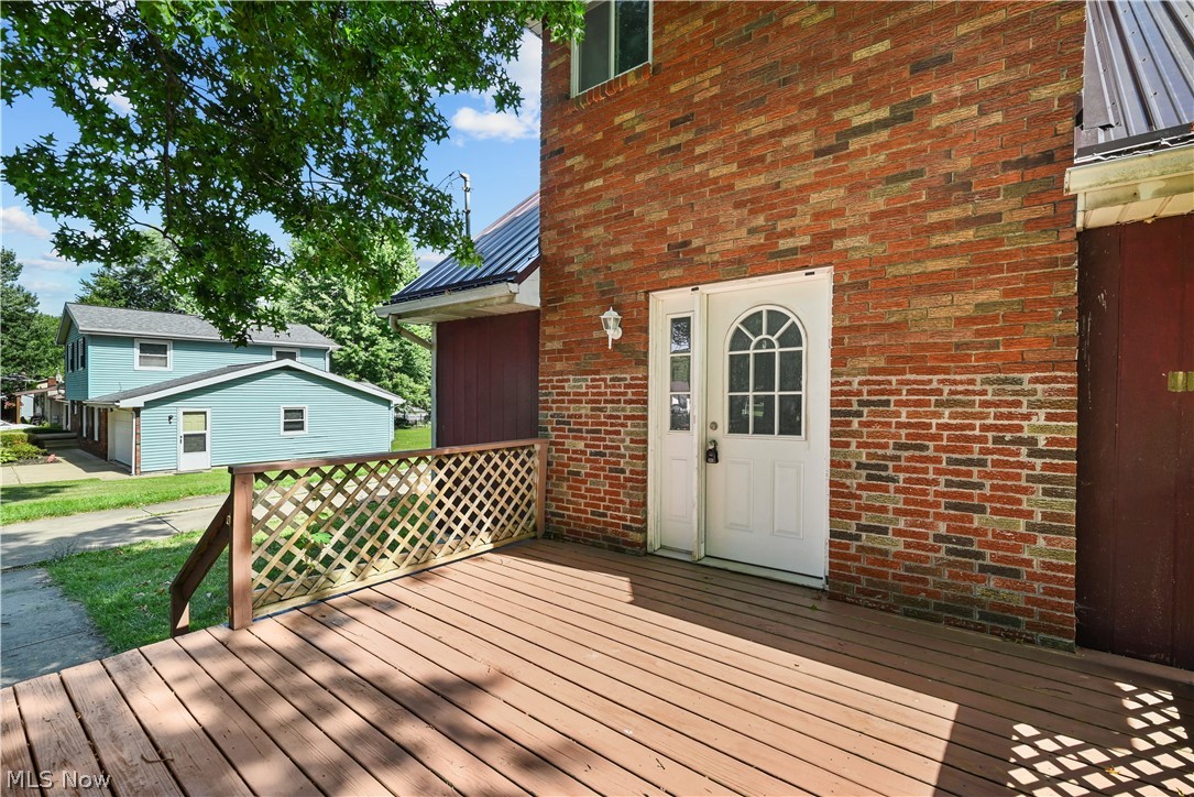 1286 Deforest Road Southeast Warren, OH 44484 - Photo 2 of 27 Spacious outdoor deck with lattice railing