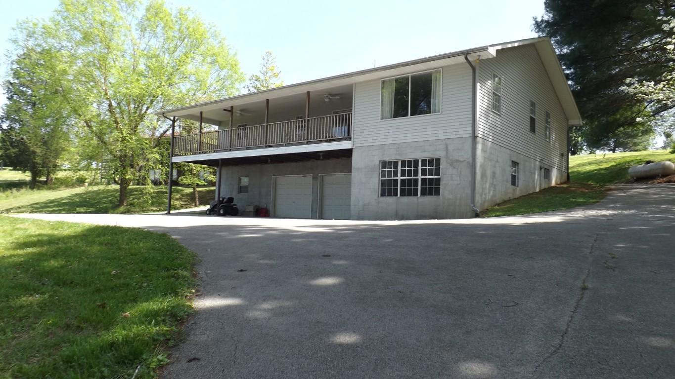 969 Ewing Road, Unit 14 Spring City, TN 37381 - Photo 20 of 27 back of home from ramp area