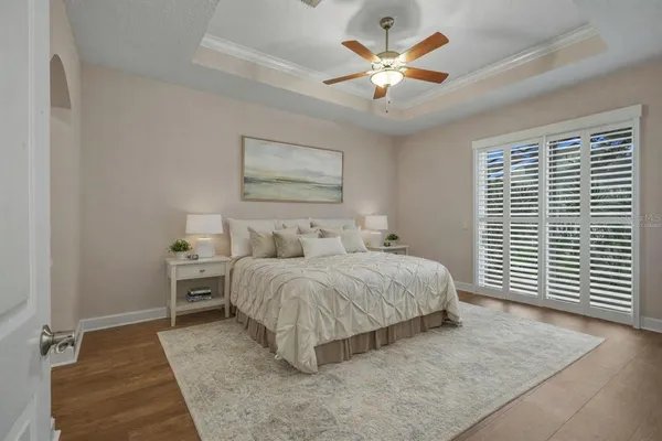 a view of a hallway with chairs and dining table