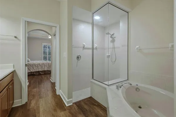a bathroom with a double vanity sink and mirror