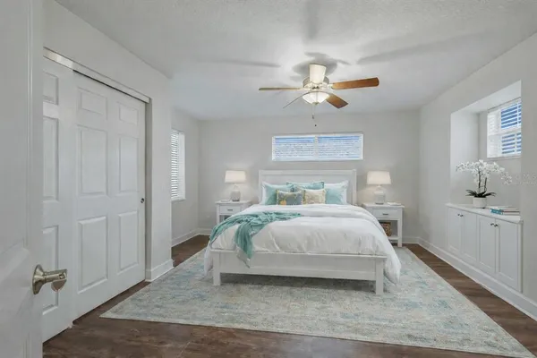 a work room with furniture and wooden floor
