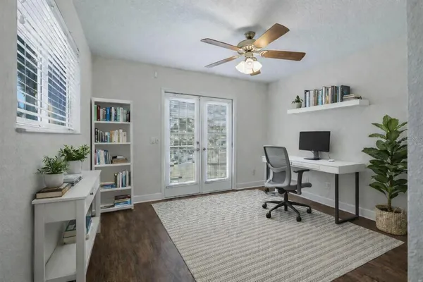 a view of a balcony with a garden
