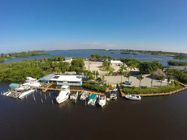 a view of a lake with a yard