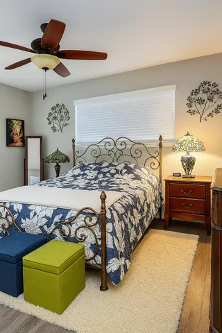 a bedroom with a bed and a chandelier