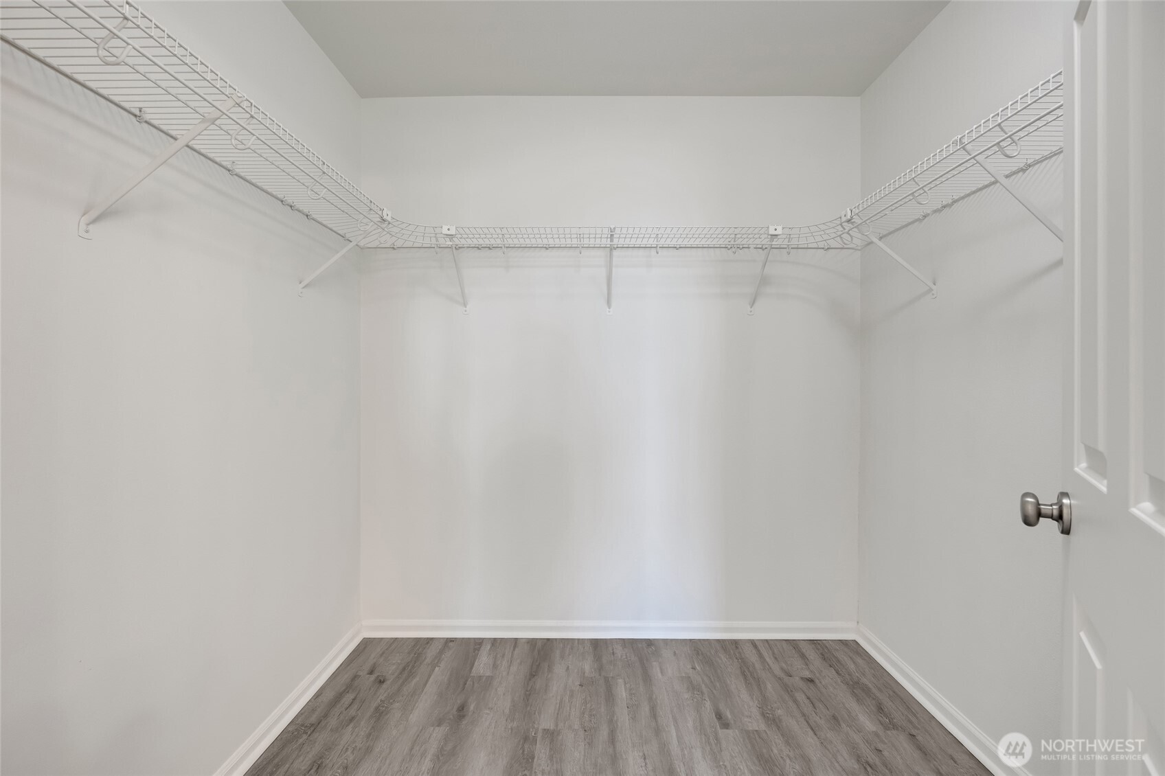 4740 Lake Place South, Unit A Renton, WA 98055 - Photo 16 of 24 a view of a room with wooden floor