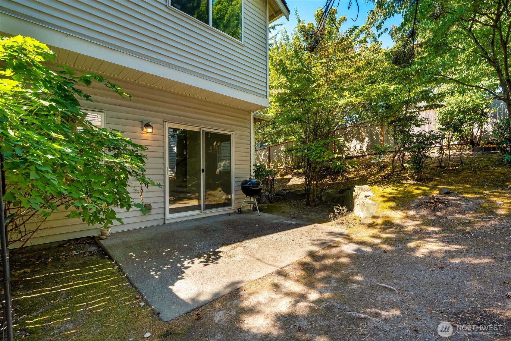 4740 Lake Place South, Unit A Renton, WA 98055 - Photo 23 of 24 a view of a backyard with sitting area