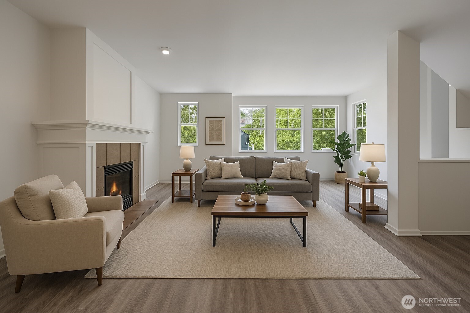 4740 Lake Place South, Unit A Renton, WA 98055 - Photo 8 of 24 a living room with furniture and a fireplace