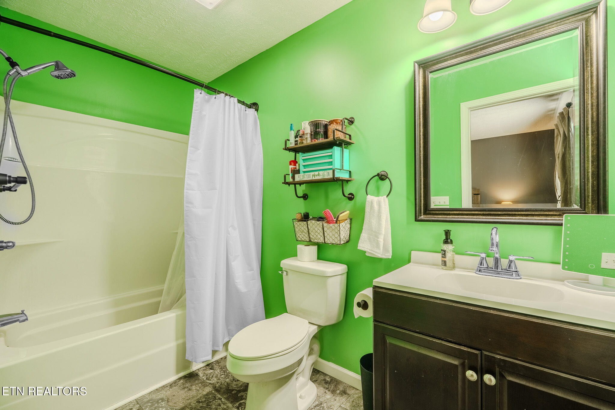 3215 Smith Road White Pine, TN 37890 - Photo 9 of 28 a bathroom with a sink toilet and shower