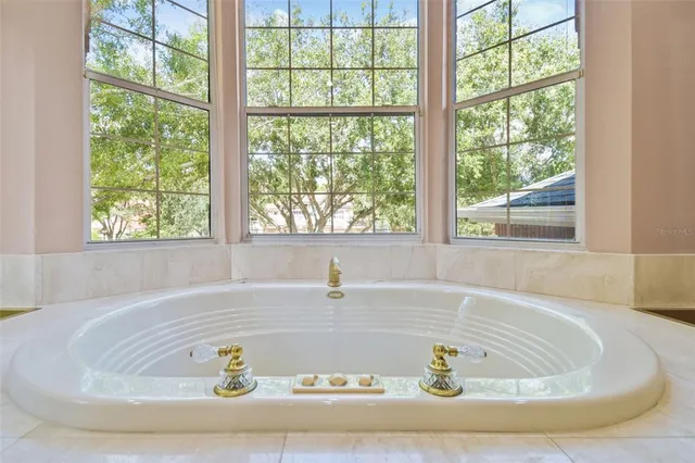 a view of entryway with wooden floor and stairs