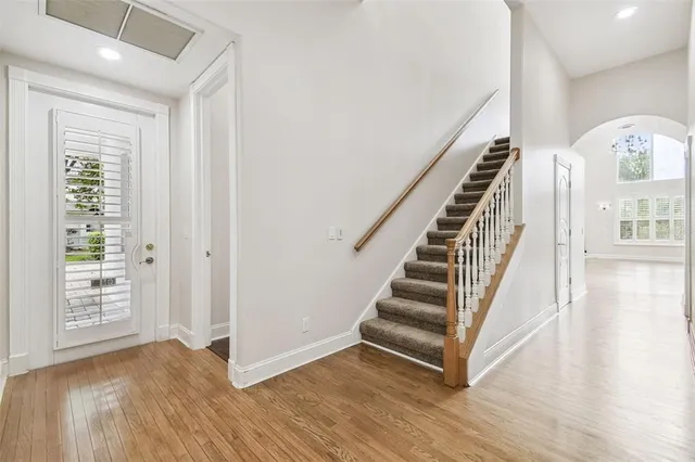 a swimming pool with outdoor seating and yard