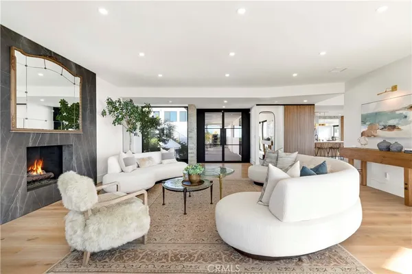 a kitchen with stainless steel appliances kitchen island granite countertop a stove and a sink with granite countertops