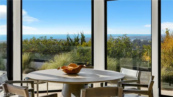 a view of an outdoor space with furniture