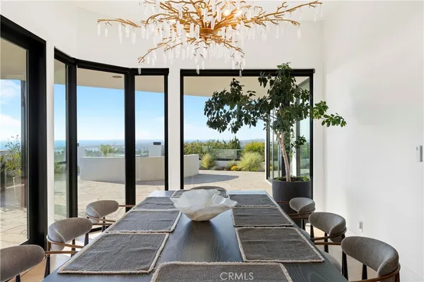 a kitchen with stainless steel appliances a refrigerator sink and cabinets