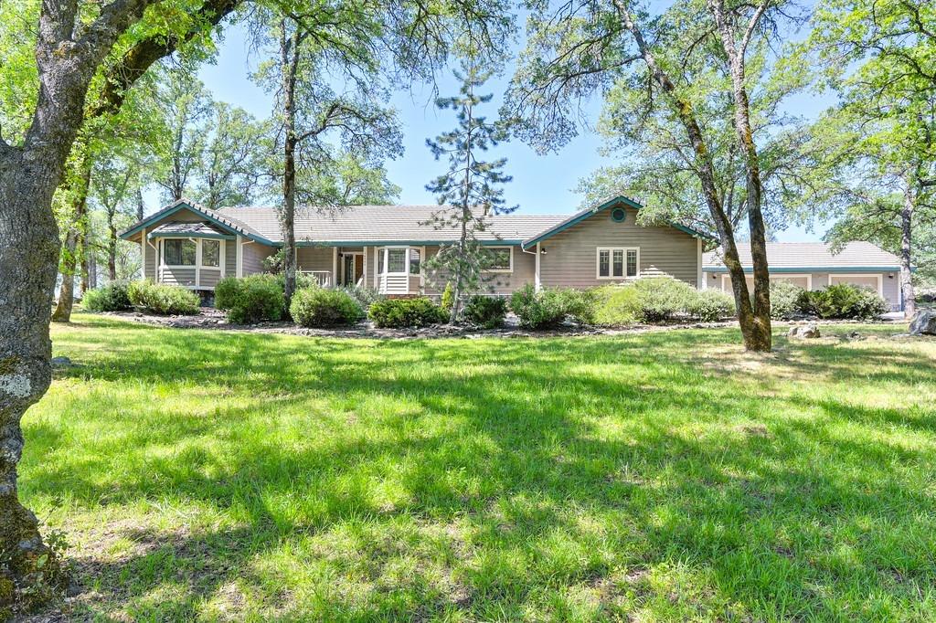 14380 Riva Ridge Circle Auburn, CA 95602 - Photo 1 of 1 a front view of a house with a yard