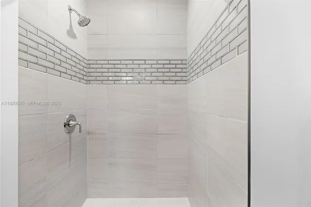 a close view of a utility room with washer and dryer