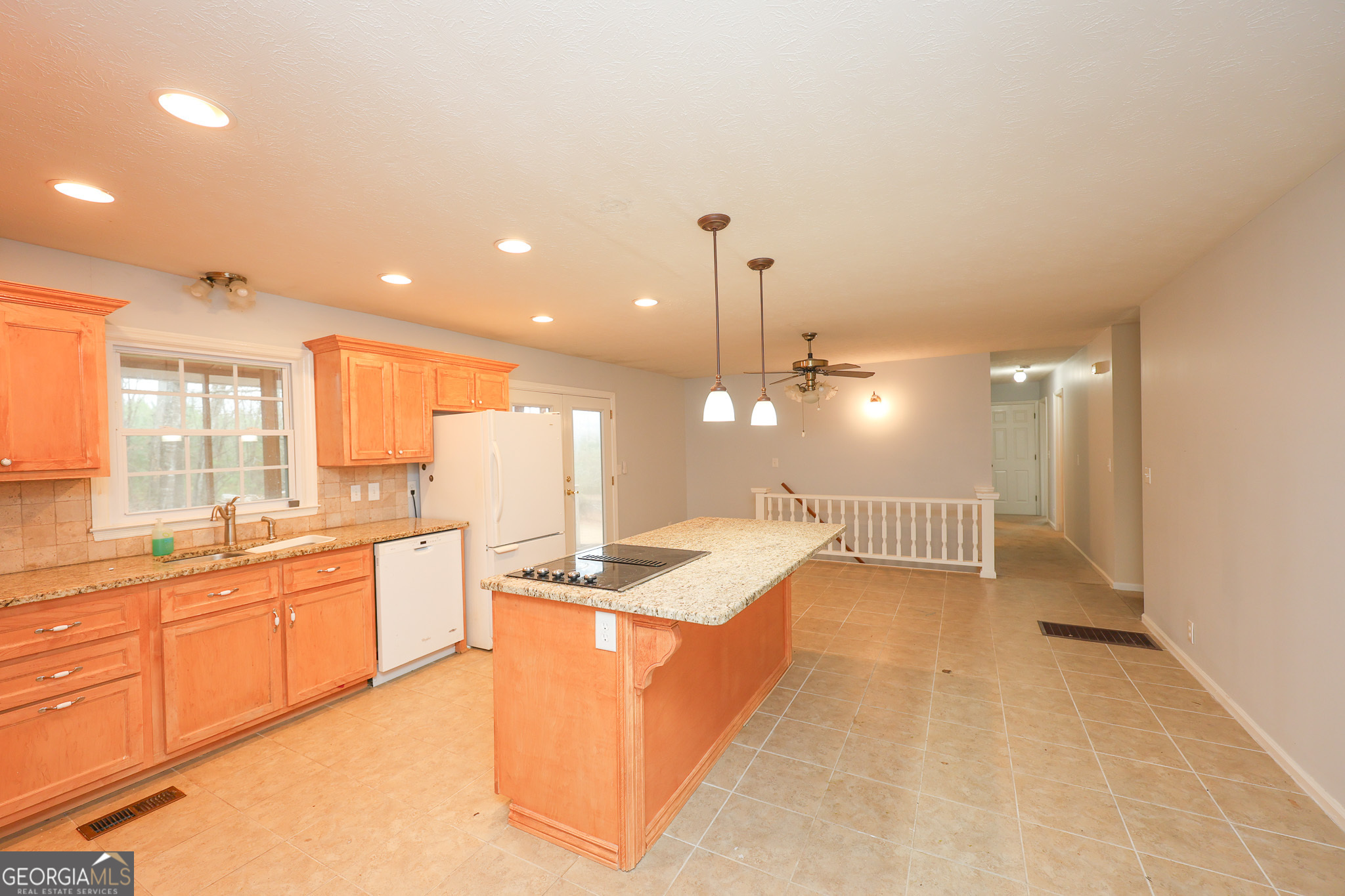 207 North View Pointe Drive LaGrange, GA 30241 - Photo 13 of 55 a large kitchen with a large counter top appliances and cabinets