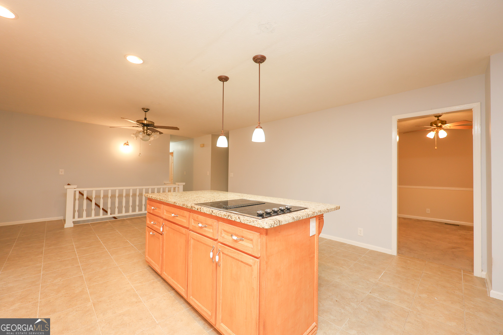 207 North View Pointe Drive LaGrange, GA 30241 - Photo 15 of 55 a kitchen that has a stove a sink and a microwave