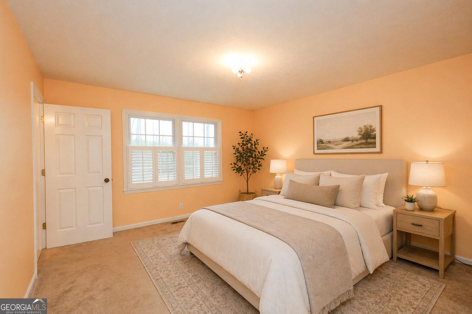 207 North View Pointe Drive LaGrange, GA 30241 - Photo 20 of 55 a bedroom with a large bed and a window