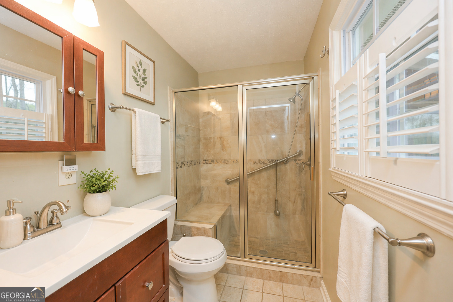 207 North View Pointe Drive LaGrange, GA 30241 - Photo 23 of 55 a bathroom with a sink toilet and shower