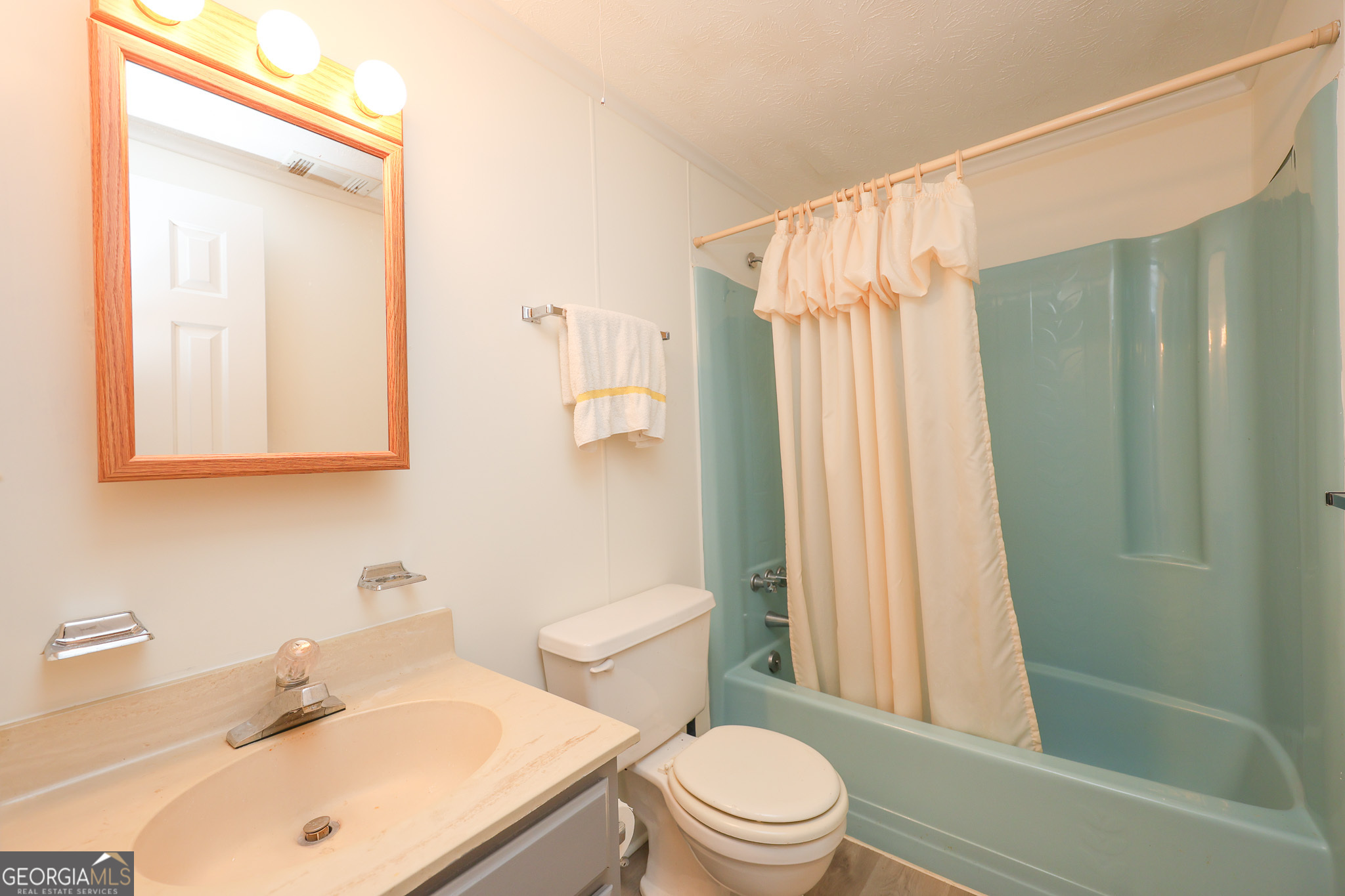 207 North View Pointe Drive LaGrange, GA 30241 - Photo 43 of 74 a bathroom with a sink a toilet and shower