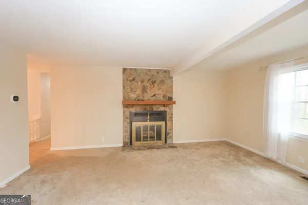 an empty room with windows