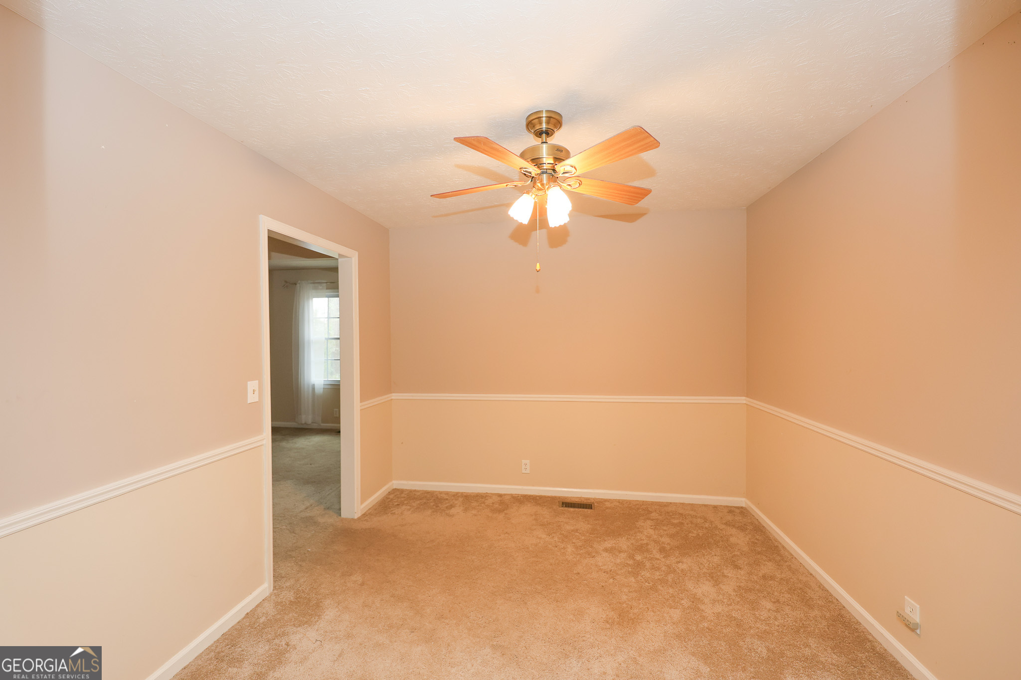 207 North View Pointe Drive LaGrange, GA 30241 - Photo 9 of 55 an empty room with a empty space and a fan