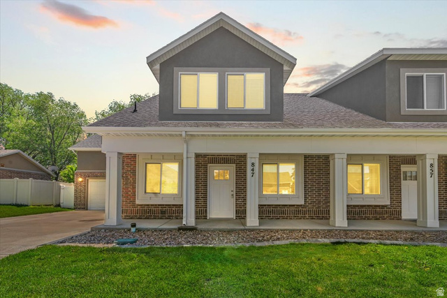 847 225 South Springville, UT 84663 - Photo 11 of 23 Modern townhome exterior featuring brick and stucco siding