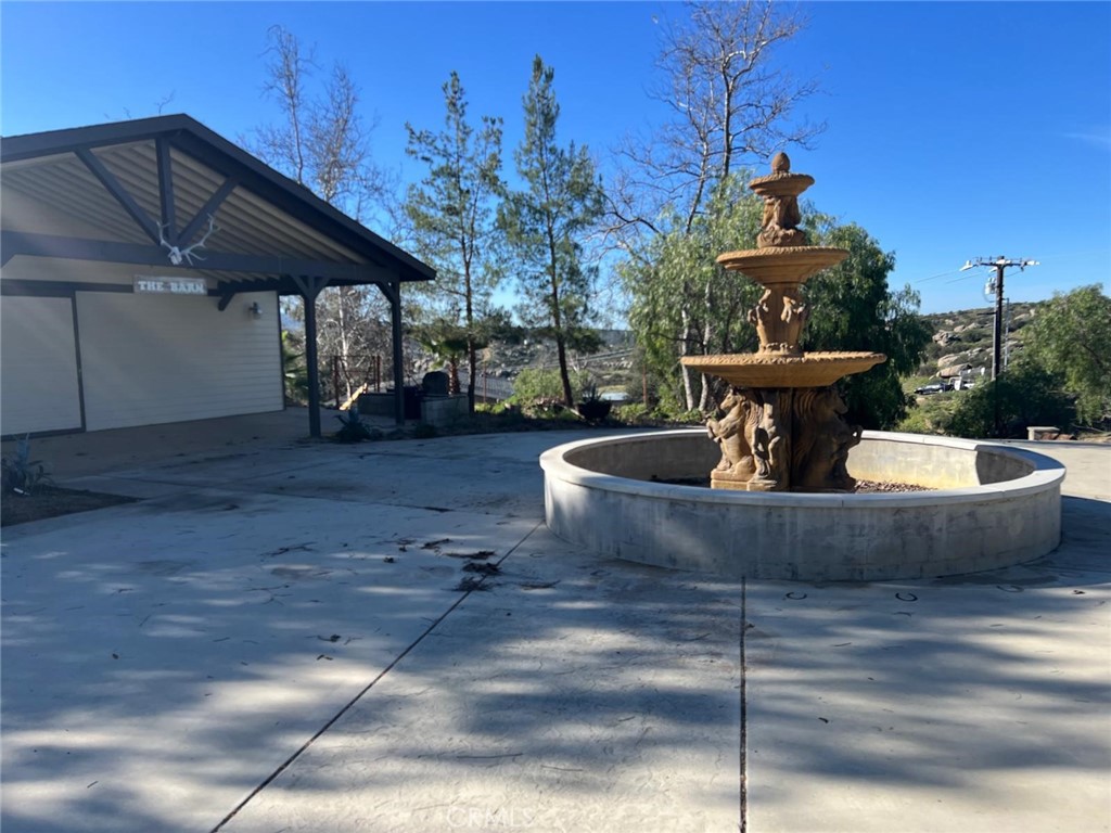 37220 Quarter Valley Road Temecula, CA 92592 - Photo 12 of 24 a view of a swimming pool with a patio