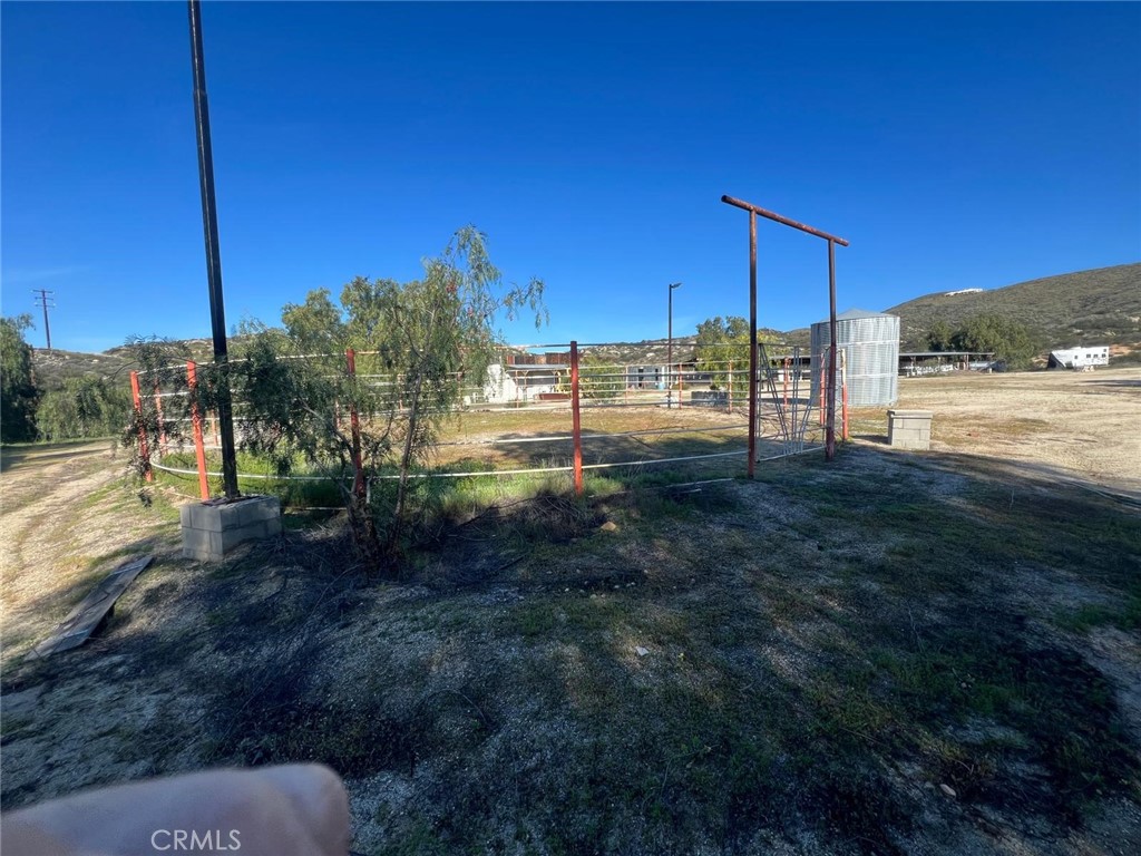 37220 Quarter Valley Road Temecula, CA 92592 - Photo 18 of 24 a view of a backyard of the house