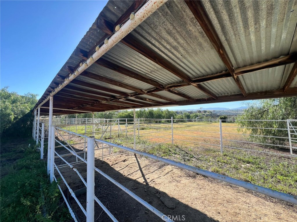37220 Quarter Valley Road Temecula, CA 92592 - Photo 20 of 24 a view of a backyard of the house