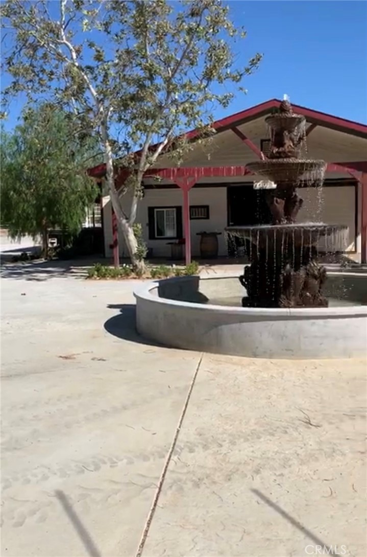 37220 Quarter Valley Road Temecula, CA 92592 - Photo 2 of 12 a view of a building with entertaining space