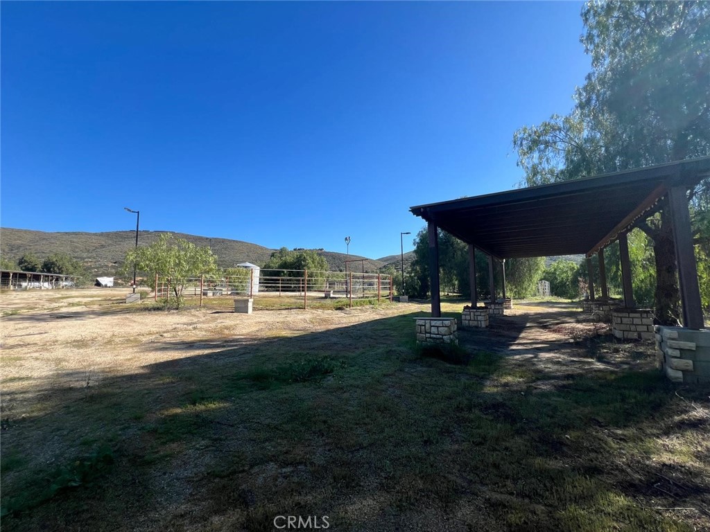 37220 Quarter Valley Road Temecula, CA 92592 - Photo 23 of 24 a view of a yard with an outdoor space
