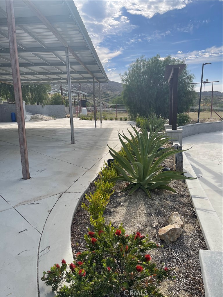 37220 Quarter Valley Road Temecula, CA 92592 - Photo 6 of 12 a view of a backyard with sitting area