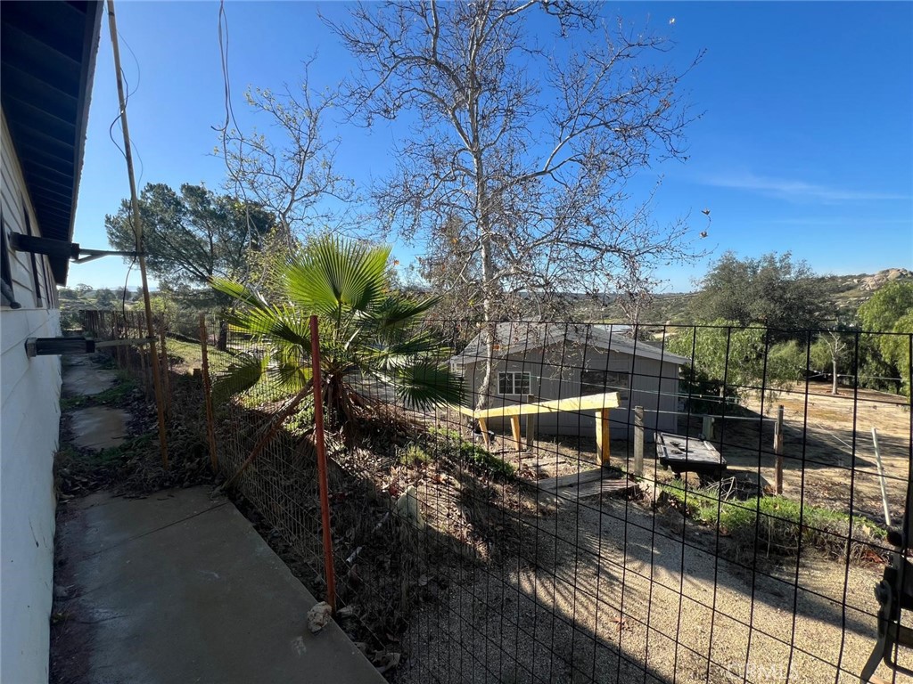 37220 Quarter Valley Road Temecula, CA 92592 - Photo 8 of 24 a view of a house with a yard