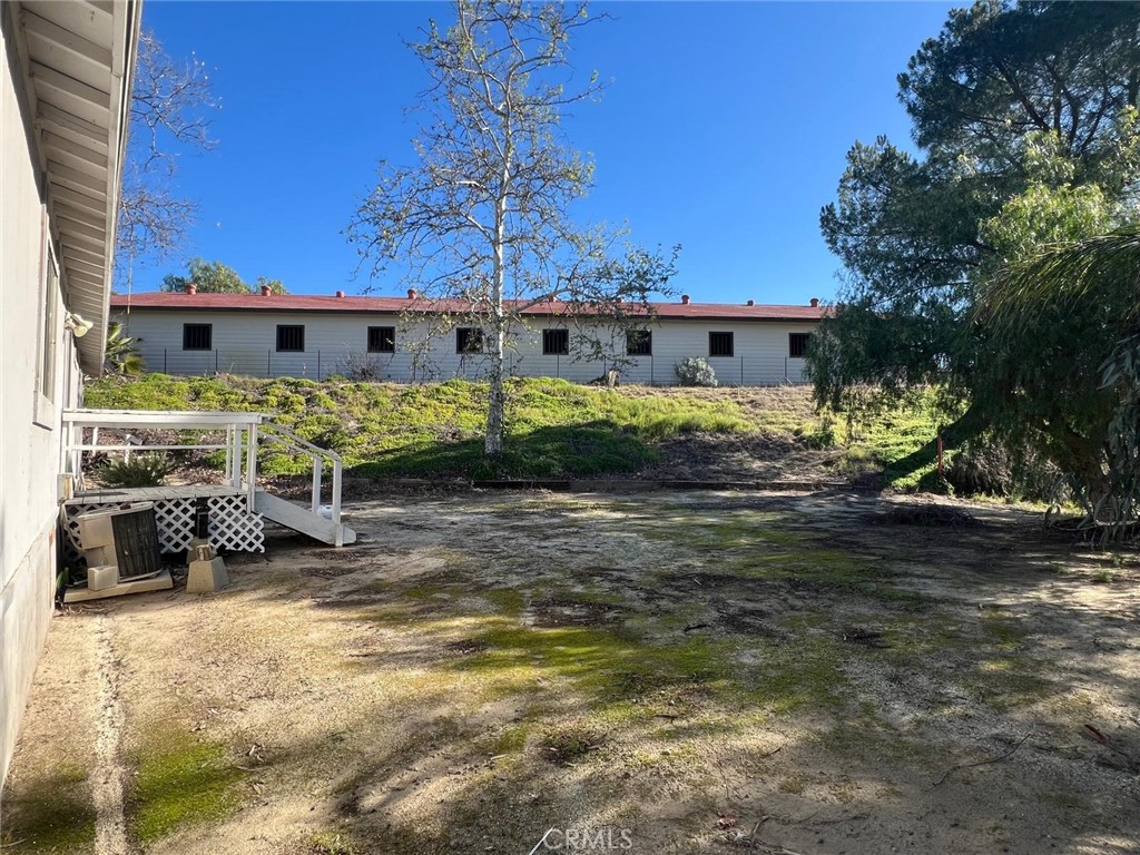 37220 Quarter Valley Road Temecula, CA 92592 - Photo 9 of 24 a view of a house with a yard