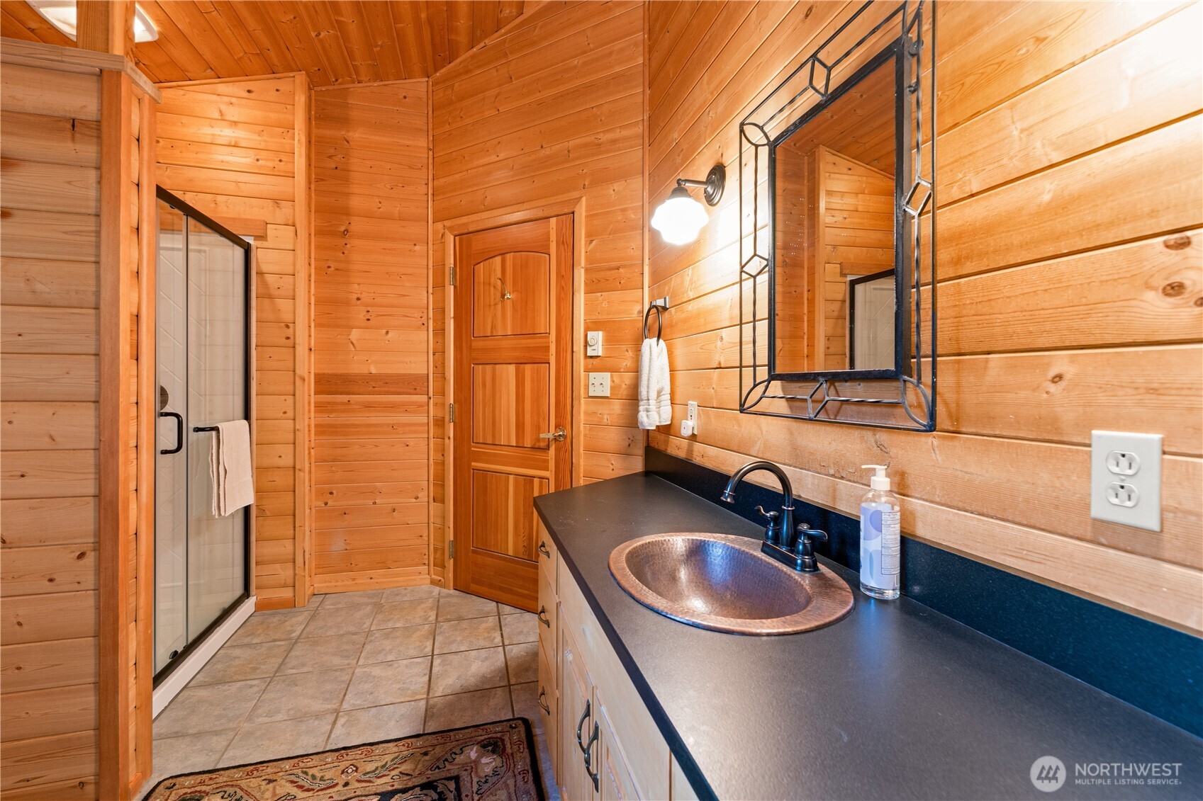 134 Sacred Moon Way Friday Harbor, WA 98250 - Photo 20 of 35 a bathroom with a sink a toilet and shower
