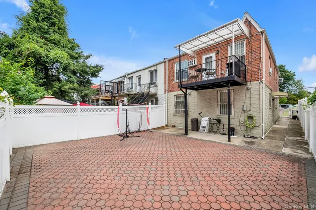 a street view with a building in the background