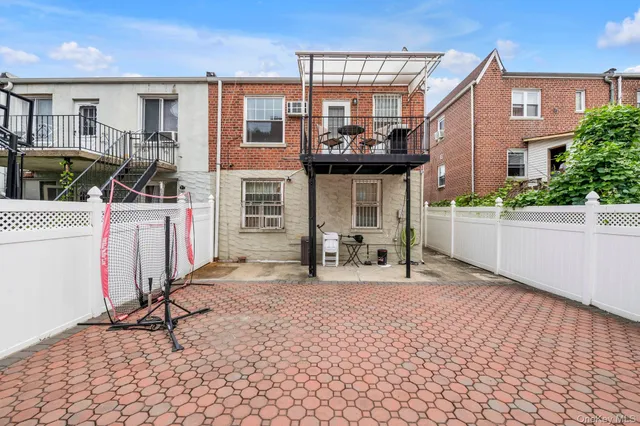 a view of a house with sitting area and furniture