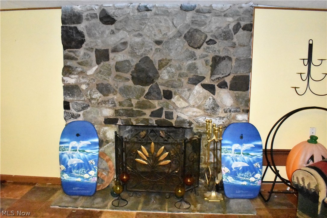 4033 Laurel Road Brunswick, OH 44212 - Photo 21 of 34 Lower level wood burning fireplace